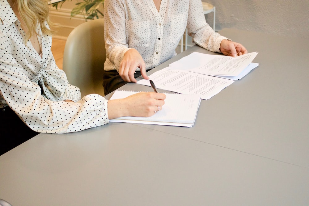 two women filing their workers’ comp claim
