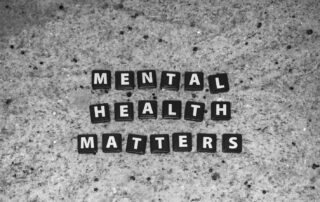“Mental health matters” text written using black blocks