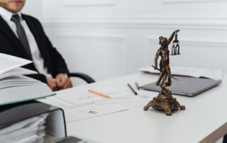 A lawyer behind his desk