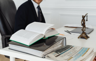 A lawyer behind his desk