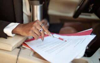 a person going through a document