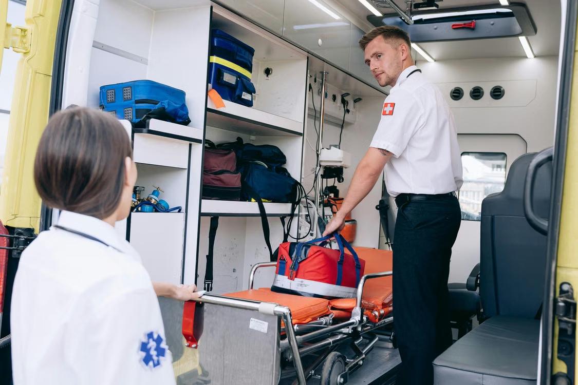 An image of two paramedics in an ambulance