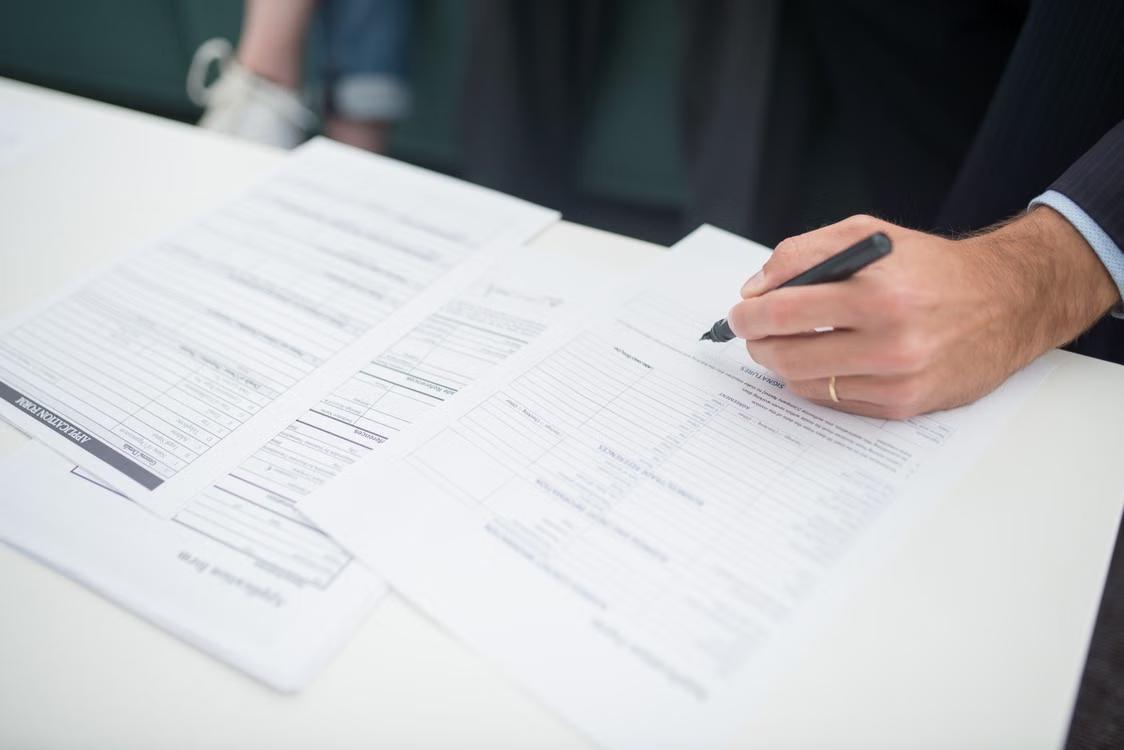 An image of an attorney reviewing documents